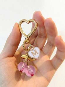 Hochwertiger modischer süßer Kirsche Gold Schmetterling Taschenanhänger - Kirsche Schlüsselanhänger stilvoller Rucksack Anhänger Dekoration, Schlüsselanhänger, Taschenanhänger Legierung Anhänger A-Z Buchstabe, Kopfhörer Anhänger, Auto Anhänger, Dekorativer Anhänger, Kirsche Schlüsselanhänger, Taschenzubehör, mit Taschenklemme, glänzendes Harz und Metall Accessoires, geeignet für Frauen Geldbörse und Tasche, Rucksack Zubehör - Verschiedenfarbig - Übersicht 4