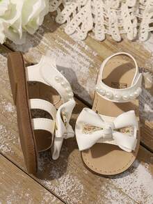 2026 Model Girls' Pearl Decor + Floral Bowknot Sandals, Comfortable Material, Non-Slip, Open Toe Design, Multi-Strap Flat, Elegant Princess Style Children Summer Sandals, Suitable For Vacation Outfits, Daily Wear, Family Gatherings And Outdoor Activities - Beige - View 5