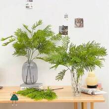 Um caule artificial de planta verde, a mimosa artificial, pode ser usado para criar paredes de flores DIY, decoração de ambientes, arranjos florais em vasos para salas de estar e quartos, casamentos, festas, decoração de casa e para preencher mesas. Coleção de materiais com folhas de outono e primavera, decoração de casa, decoração de mesa, decoração em estilo campestre, decoração externa. - Verde - Ver 7