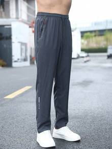 Men's Lightweight Breathable Quick Dry Zipper Pocket Sweatpants, Fashionable Casual Solid Long Pants For Summer, Fall - Dark Grey - View 1