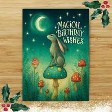 一张精美的“魔法生日祝福”贺卡，附信封，以月光下的兔子为设计元素，搭配奇幻森林图案和蓝绿色调，是送给奇幻爱好者和亲朋好友的完美礼物，也是生日庆祝的理想之选。魔法兔子生日贺卡|奇幻森林贺卡|纸质贺卡 - 彩色 - 查看 10