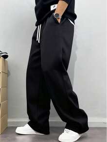 1PC These Men's Casual Sweatpants Feature A Loose, Straight-Leg Fit And A Thermal Lined Interior For A Comfortable, Drapey Feel. Perfect For Both Home And Outdoor Wear, They Also Make A Great Gift For Couples. Made From 100% Polyester, They Feature A Drawstring Waistband For Easy Length Adjustment And Are Available In A Variety Of Colors.