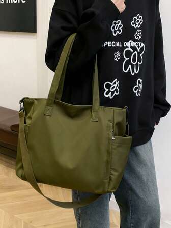 简约多口袋大容量通勤女式手提包，休闲百搭帆布单肩包，轻便可折叠拉链封口，适合日常使用、工作、上学、大学等场合。