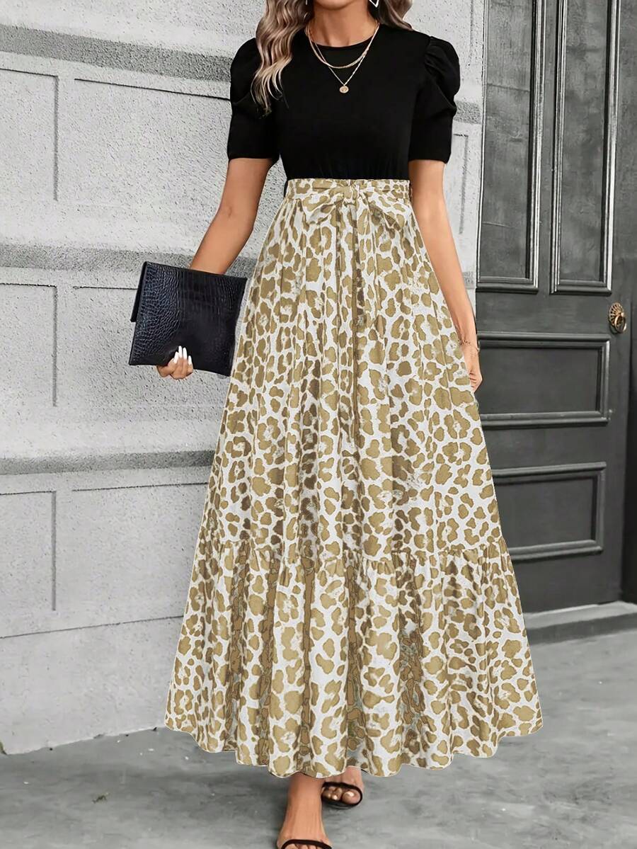 Keke Bloomly 最新款女士A字连衣裙，优雅泡泡袖，腰部蝴蝶结收腰设计，圆领，可机洗，适合春夏休闲半正式场合穿着。豹纹拼接黑色上衣设计，适合日常、度假、通勤、海滩、派对等各种场合。面料轻盈透气，尽显时尚女性魅力。