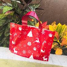10/20 pièces Sacs cadeaux de Noël, motifs d'arbre de Noël rouge, de renne, d'étoile, de flocon de neige. Sacs cadeaux pour décoration de fête de Noël, fournitures d'emballage de cadeaux pour rassemblement familial de Noël, sacs en plastique pour shopping de Noël, sacs en plastique durables, fournitures d'emballage de cuisine de Noël, décoration du Nouvel An 2026, décorations de Noël, cadeaux de Noël, faveurs de fête