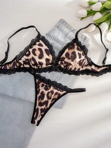 1 conjunto de lencería sexy con sostén y tanga con patchwork de encaje negro y estampado de leopardo con lazo - Negro - Ver 5