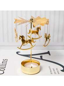 这款旋转金色烛台饰有风车和月亮造型，适合作为万圣节和圣诞节礼物。旋转烛台（不含蜡烛）。这款金色旋转烛台可营造浪漫的婚礼、圣诞派对或餐桌装饰氛围。节日礼物（款式随机），适合斋月、中东和穆斯林使用。 - 金色 - 查看 2