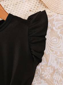 Chiếc đầm hè thanh lịch và duyên dáng này được thiết kế dành cho các bé gái, gồm đầm không tay cổ tròn in họa tiết da báo với nơ ở eo. - màu đen - Xem 5