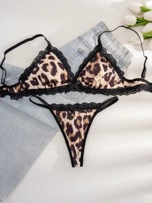 1 conjunto de lencería sexy con sostén y tanga con patchwork de encaje negro y estampado de leopardo con lazo - Negro - Ver 2