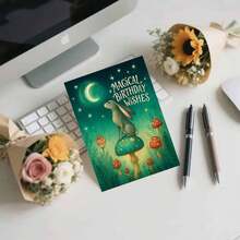 一张精美的“魔法生日祝福”贺卡，附信封，以月光下的兔子为设计元素，搭配奇幻森林图案和蓝绿色调，是送给奇幻爱好者和亲朋好友的完美礼物，也是生日庆祝的理想之选。魔法兔子生日贺卡|奇幻森林贺卡|纸质贺卡 - 彩色 - 查看 11