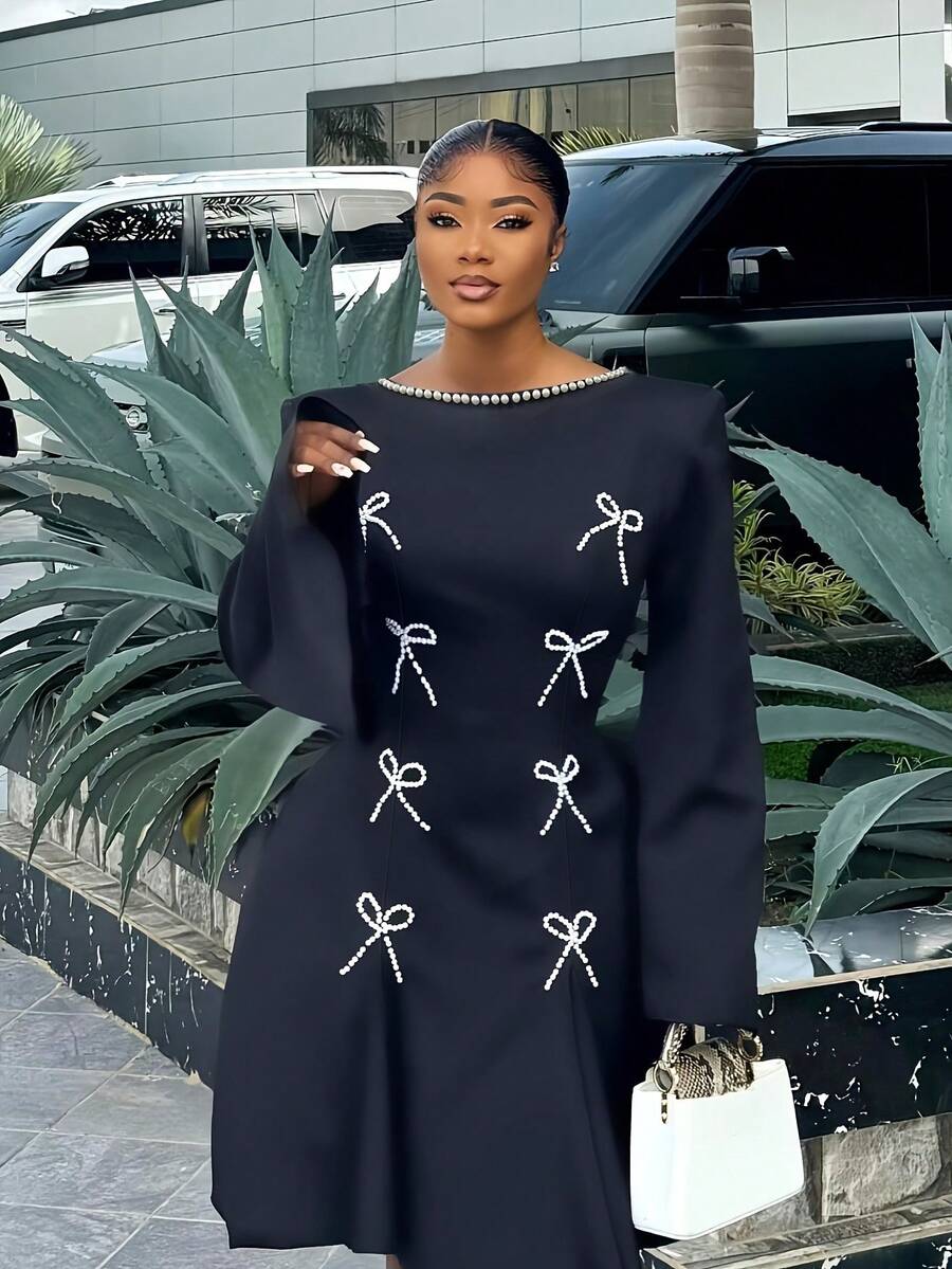 Đầm hở lưng đính nơ ngọc trai thanh lịch dành cho nữ, phù hợp đi làm, đi làm văn phòng, đi làm hàng ngày, mùa xuân và mùa thu; Đầm ngắn thắt nơ xếp ly/diềm bèo nhún thanh lịch màu trơn dành cho nữ, phù hợp cho đám cưới, hẹn hò buổi tối, văn phòng, tiệc trà hàng ngày - màu đen - Xem 1