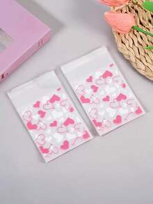 100个心形图案包装袋，透明自粘小袋，适用于婚礼礼物、生日茶会、卡片分隔袋、照片自粘袋、爱心包装袋，带自封口，适合情人节使用。 - 彩色 - 查看 4