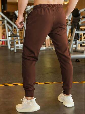 男士健身休闲运动裤，透气柔软抽绳长裤，带字母拉链口袋，适合送给男友/丈夫