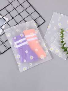 PEVA材质衣物收纳袋，小雏菊印花旅行收纳袋，透明PVC衣物分类袋，防水拉链内衣收纳袋，日常小雏菊图案家居衣物收纳盒，磨砂透明收纳袋，运输包装袋，可用于包装T恤、衬衫、鞋子、文件、衣物等，可重复使用的磨砂自封袋，节省空间的旅行收纳袋