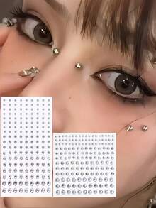 2张（345件）假穿孔饰品套装，包括假脸部穿孔、假唇钉、假鼻钉等，自粘式唇环、眉环、鼻环和肚脐环，适用于舞会、万圣节、音乐节等场合。 - 彩色 - 查看 1
