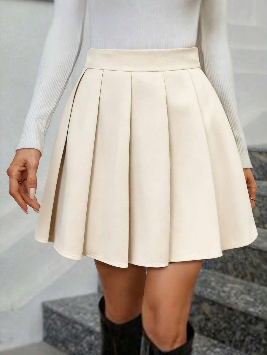 Keke Bloomly Nouvelle jupe mini plissée élégante et mince de style estival chaud abricot avec un style minimaliste vintage polyvalent