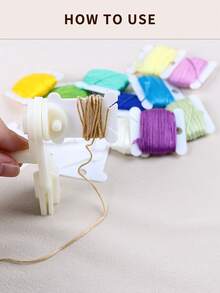 一套白色DIY手工刺绣十字绣线轴及绕线器工具套装，包含50或100个线轴和1个绕线器。 - 彩色 - 查看 4