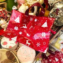 10/20 pièces Sacs cadeaux de Noël, motifs d'arbre de Noël rouge, de renne, d'étoile, de flocon de neige. Sacs cadeaux pour décoration de fête de Noël, fournitures d'emballage de cadeaux pour rassemblement familial de Noël, sacs en plastique pour shopping de Noël, sacs en plastique durables, fournitures d'emballage de cuisine de Noël, décoration du Nouvel An 2026, décorations de Noël, cadeaux de Noël, faveurs de fête