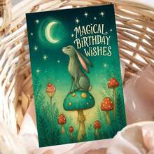 一张精美的“魔法生日祝福”贺卡，附信封，以月光下的兔子为设计元素，搭配奇幻森林图案和蓝绿色调，是送给奇幻爱好者和亲朋好友的完美礼物，也是生日庆祝的理想之选。魔法兔子生日贺卡|奇幻森林贺卡|纸质贺卡 - 彩色 - 查看 12