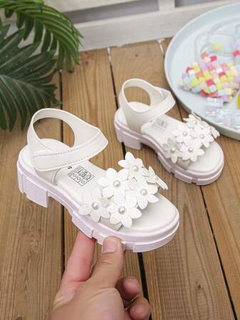 1 par moderiktiga barnsandaler med blomdekor och tjock sula, mjuka och bekväma, lämpliga för sommaren