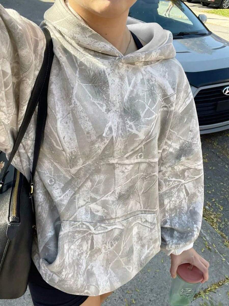 2026 Premium Apparel[Autumn Forest Print Hoodie: Earthy Style Meets Cloud-Like Comfort] This Hoodie Stars A Moody Autumn Forest Print-Weathered Branches And Muted Maple Leaves That Lean Into Rustic, Outdoorsy Charm (A Hit For American Casual Aesthetics). At Its Core Is Soft Brushed Fleece Fabric: It Glides Gently Against Skin With Zero Itchiness, Traps Mild Warmth (Ideal For 45–65°F Fall Days), And Stays Breathable Enough To Avoid Stuffiness During Hikes, Errand Runs, Or Lazy Afternoons. Autumn Forest Print Fleece Rustic Woodland Brushed  Oversized Hoodie - Màu Xám nhạt - Xem 1