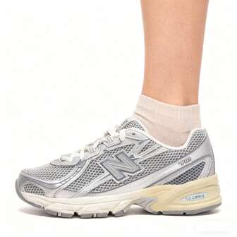 New Balance Unisex andningsbara mesh-sneakers, lätta och bekväma för vardagsbruk, klassrum, promenader, lämpliga för klänningar/cargobyxor