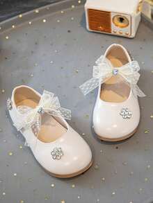 1双儿童蝴蝶结公主鞋，时尚春秋新款女童软底表演鞋， - 米色 - 查看 1