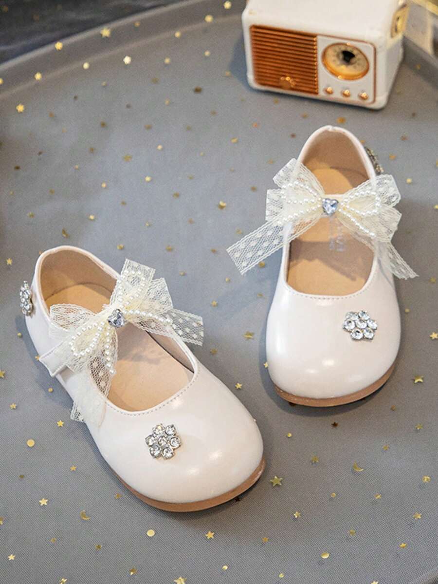 1双儿童蝴蝶结公主鞋，时尚春秋新款女童软底表演鞋， - 米色 - 查看 1