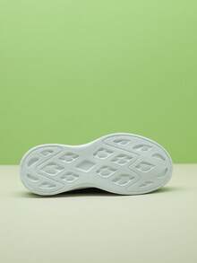 男女通用黑白针织袜套式运动鞋，轻便透气休闲运动跑步鞋