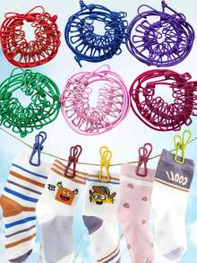 6 قطع طقم حبل غسيل محمول مع 12 مشبك، مقاوم للرياح للسفر، مطاطي وقابل للسحب، مناسب للحديقة والمنزل العطلات والفنادق. خفيف الوزن، متين، موفر للمساحة، قابل للتعديل الطول، مناسب للاستخدام الداخلي والخارجي مثل الحمام والشرفة والمركبة السياحية والتخييم والشاطئ والمنزل. - متعدد الألوان - مشاهدة 2