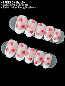 24片椭圆形美甲贴纸，饰以简约心形图案和红色爱心。本套装包含亚克力美甲贴纸，适合女士约会、派对、日常工作、情人节礼物等场合，提升您的魅力。美甲护理产品，美甲，亚克力美甲贴纸套装。美甲用品 - 彩色 - 查看 3