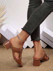 This Ladies' Sandal Is A Versatile Essential For Summer Outfits. The Main Material Is A Soft, Durable Faux Leather In A Classic Brown Color. It Offers A Comfortable Feel And Good Wearability, Only Needing A Light Wipe With A Damp Cloth To Maintain Cleanliness. The Design Features A Classic Mule Slip-On Style, Without A Back Heel, Making It Easy To Put On And Take Off. This Makes It Convenient For Commuting Early In The Morning Or Quick Errands.