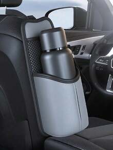 汽车座椅侧边收纳袋——采用纳帕纹理皮革制成，抗皱防裂。边缘采用精密缝线，增强承重能力。包含杯架、纸巾槽、太阳镜隔层和隐藏式侧袋。适用于轿车、SUV、MPV、越野车及其他车型。 - 彩色 - 查看 2