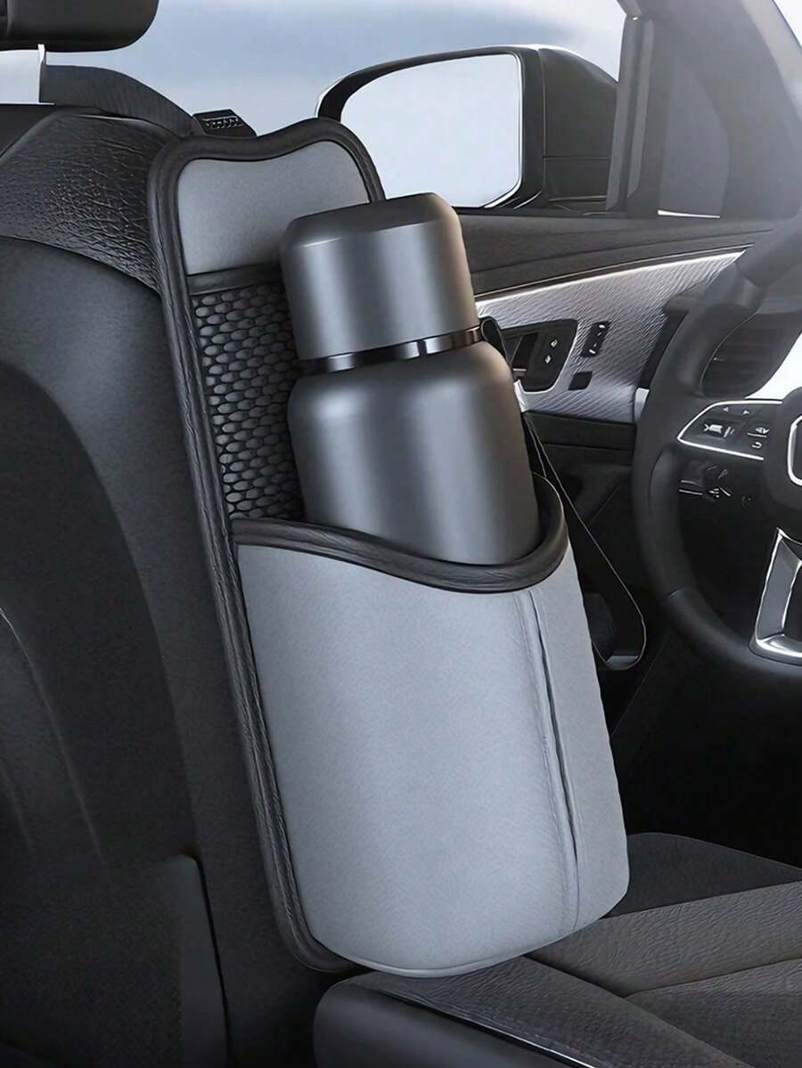 汽车座椅侧边收纳袋——采用纳帕纹理皮革制成，抗皱防裂。边缘采用精密缝线，增强承重能力。包含杯架、纸巾槽、太阳镜隔层和隐藏式侧袋。适用于轿车、SUV、MPV、越野车及其他车型。