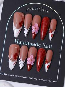 手工制作的红色法式Y2K风格长款尖头美甲贴片，饰以3D手绘粉色雕刻和手绘渐变花卉图案，适用于美甲装饰。包含1片甲油胶和1把指甲锉。适合日常佩戴以及科切拉音乐节等活动，是美甲贴纸和美甲护理产品的理想之选。美甲用品 - 紅色 - 查看 3