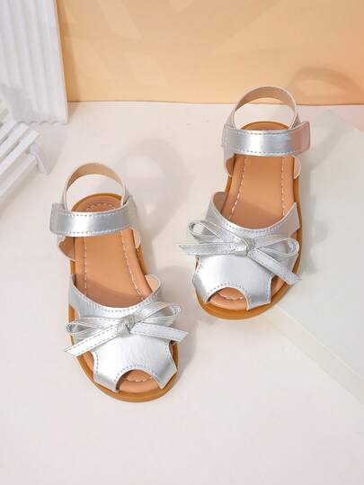 1 Pair, Girls' Cute Princess Style Sandals, Sparkly Metallic Silver, Satin Bow Decoration, Faux Leather, Breathable Open Toe, Hook-And-Loop Strap, Flat Soft Sole, Perfect For Birthday Parties / Festive Gatherings