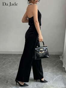 Salopetă elegantă pentru femei, cu guler halter, cu decorațiuni, textură moale, potrivită pentru primăvară/vară, potrivită pentru prezentări de modă, festivaluri, purtare zilnică, zile de naștere, petreceri, călătorii, aeroporturi, Crăciun, Revelion și alte ocazii. - Negru - Vizualizare 2