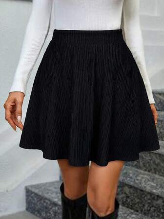 Falda casual asimétrica acanalada de color negro sólido Keke Bloomly para mujer, versátil para el trabajo, citas, vacaciones, fiestas, reuniones, con la cintura ceñida