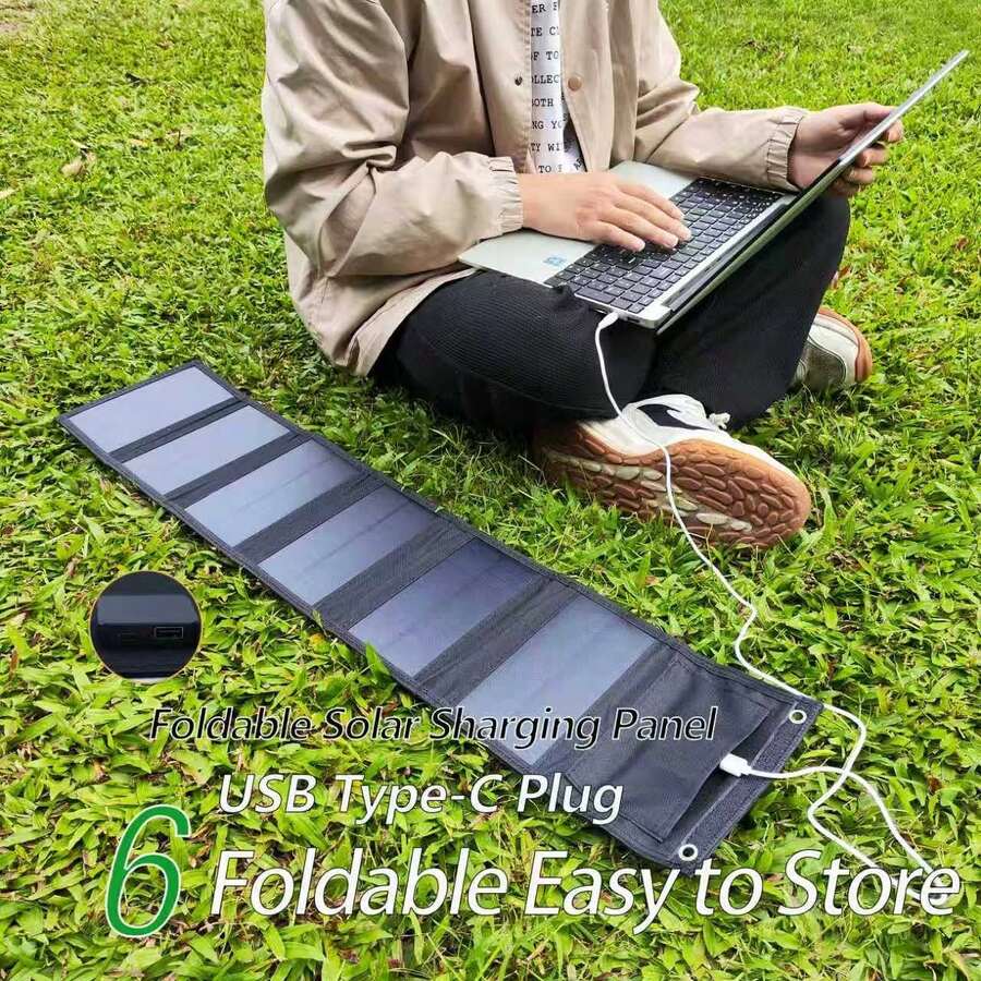 便携式可折叠太阳能充电板，配备 USB + Type-C 双端口，采用单晶硅太阳能电池板，适用于为智能手机、平板电脑、笔记本电脑、相机和其他数码设备充电。