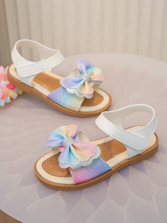 A Pair Of Children's And Girls' Bow Sandals, Colorful Bow Sandals, White Leather, Soft, Comfortable, Light And Comfortable Summer Shoes! This Cute Open-Toe Design Comes With Adjustable Ankle Straps To Ensure A Secure Fit. Add A Touch Of Magic To Any Outfit. The Breathable Lining Keeps The Little Feet Cool.