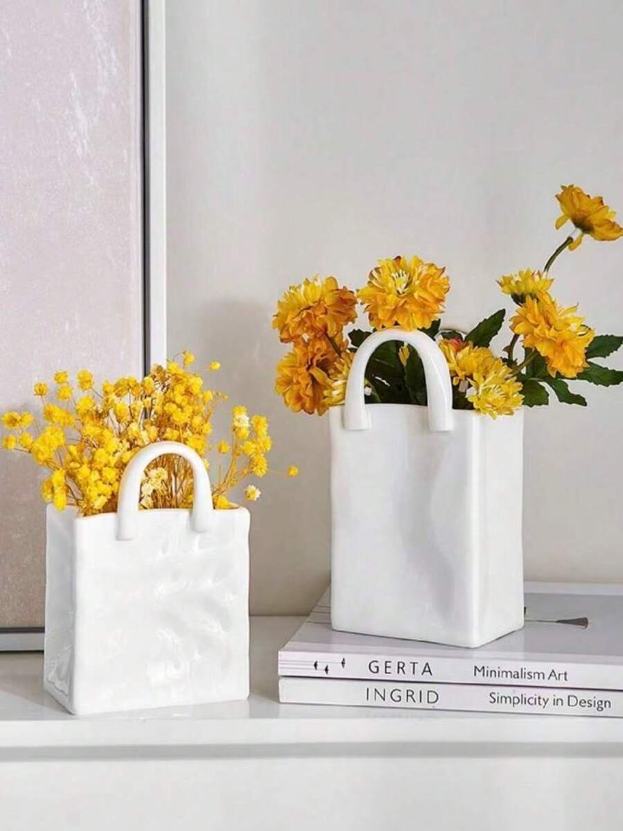 1个白色和金色手提包造型树脂花瓶，这款手提包花瓶非常适合在咖啡桌、梳妆台、客厅和卧室摆放鲜花，为家居装饰增添迷人的现代气息，也适合作为情人节礼物。 - 彩色 - 查看 1