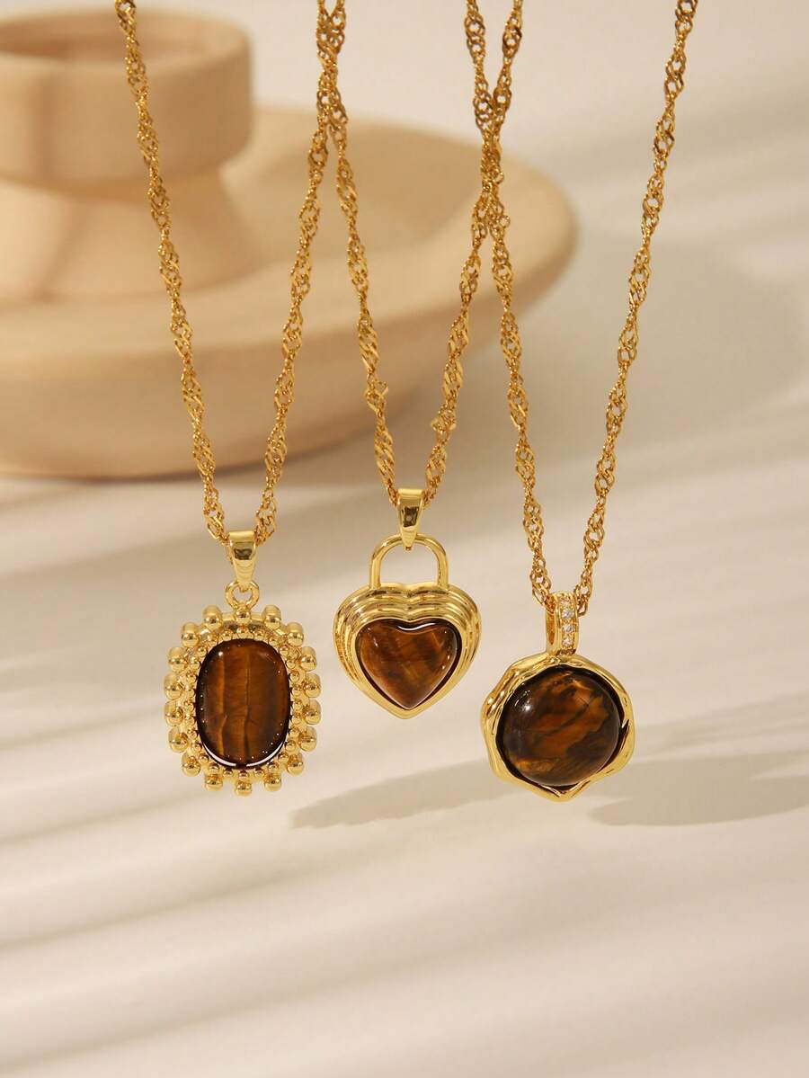 1件复古棕色宝石不锈钢吊坠项链，椭圆形太阳心形镀金水钻颈链，适合女性日常、约会、节日佩戴或作为礼物，尤其适合冬季佩戴。