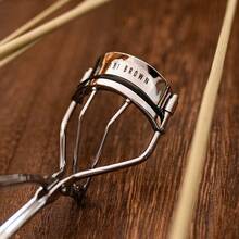 Bobbi Brown Naturally Curled Eyelash Curler, Long-Lasting Portable Eyelash Curler, Makeup Tool - Bright Silver - View 2