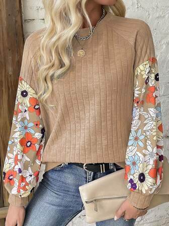 This Versatile Women's Long Sleeve Top Features A Round Neck Knit Fabric, Paired With A Fashionable Floral Print Raglan Sleeve Design. It Has Medium Stretch, Suitable For Everyday Wear.