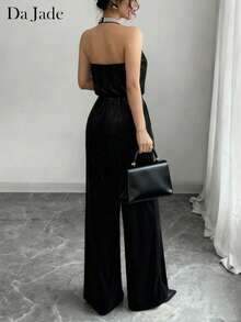 Salopetă elegantă pentru femei, cu guler halter, cu decorațiuni, textură moale, potrivită pentru primăvară/vară, potrivită pentru prezentări de modă, festivaluri, purtare zilnică, zile de naștere, petreceri, călătorii, aeroporturi, Crăciun, Revelion și alte ocazii. - Negru - Vizualizare 3