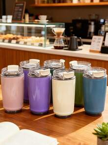 1 pieza Botella de agua aislada de acero inoxidable con estilo minimalista, opciones de varios colores, doble pared al vacío, a prueba de fugas, diseño antideslizante, adecuado para regalos de negocios, regalos para el hogar, unisex, para todas las estaciones, aislamiento perfecto y suave para un control de temperatura duradero, taza portátil de café/té para el hogar, la oficina, los viajes por carretera, el camping, el senderismo, los deportes, los picnics - Multicolor - Ver 2