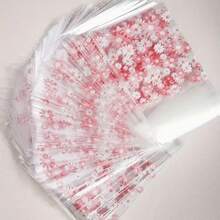 50/100 piezas, Bolsas de embalaje de plástico con estampado de margaritas, Bolsas de caramelos transparentes autoadhesivas, Adecuadas para regalos de fiesta y embalaje de regalos - Multicolor - Ver 2