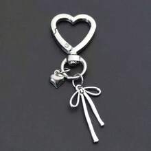 新款不锈钢金色口红网袋挂饰，时尚口红袋吊坠，钥匙扣配饰，女孩礼物，精致口红装饰吊坠，蝴蝶结钥匙扣，闪亮派对礼物（青少年适用） - 彩色 - 查看 9