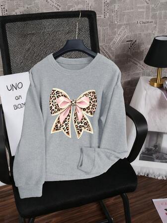 Suéter de punto con lazo y estampado de leopardo para mujer, cuello redondo, mangas largas, casual y de moda, adecuado para otoño e invierno. Un gran regalo para Año Nuevo o San Valentín. Sudadera de mujer con diseño estampado.