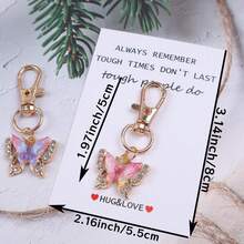 12个“拥抱与爱”口袋拥抱代币，口袋拥抱卡片。附赠励志蝴蝶钥匙扣套装，适合装饰背包、手提包和车钥匙，男女皆宜。这款独特的魅力礼物充满激励和鼓舞，适合任何需要支持和肯定的人。也可作为纪念礼物、友谊礼物、情人节礼物、返校礼物和毕业礼物。 - 彩色 - 查看 4